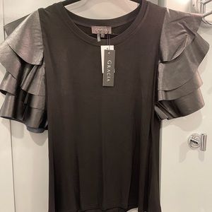 Garcia brand shirt from Bloomingdales with faux leather sleeves.